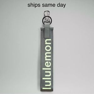 Lululemon never lost keychain grey sage faded zap NWT